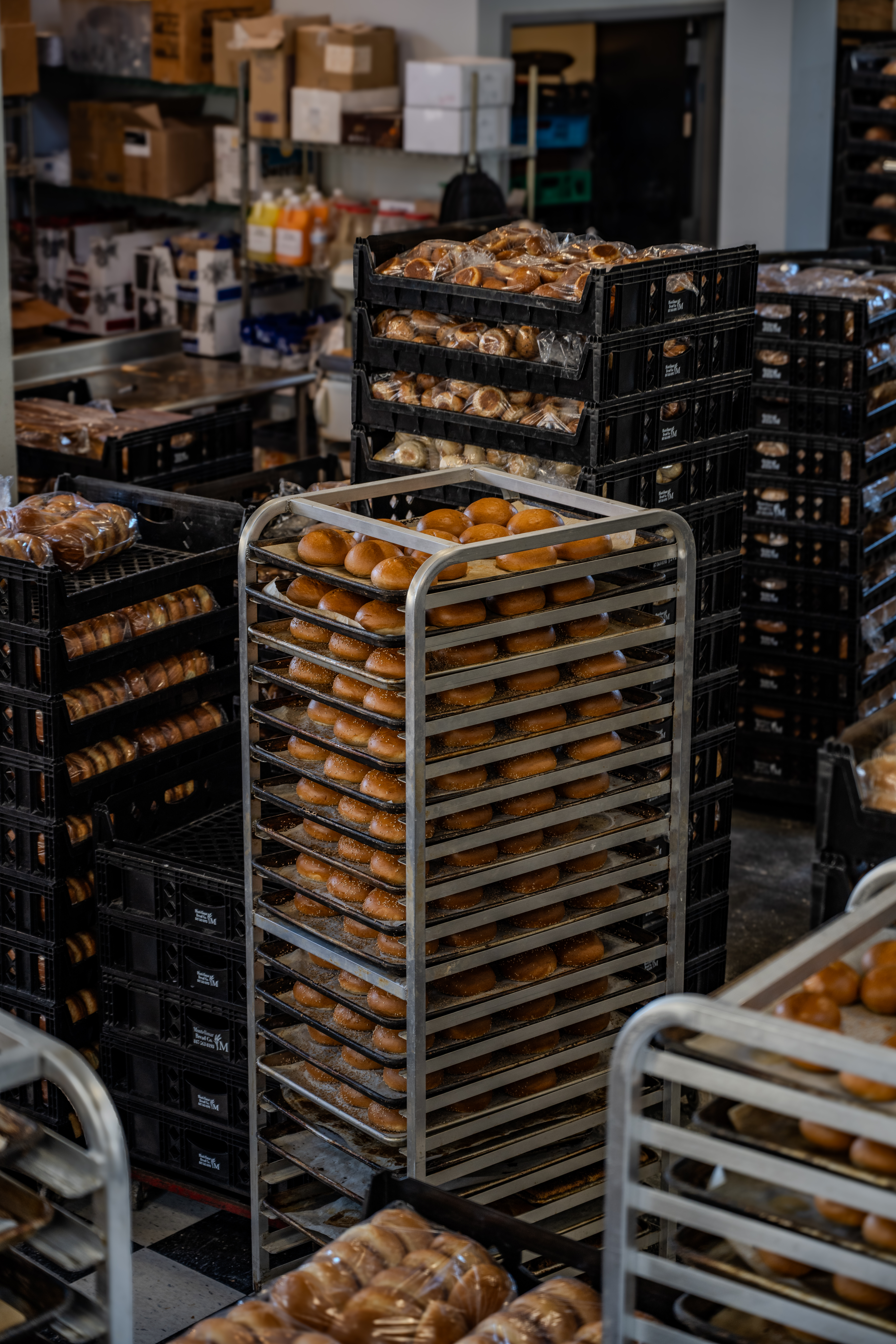Racks of fresh-baked rolls in production at Montelimar Bread Co.